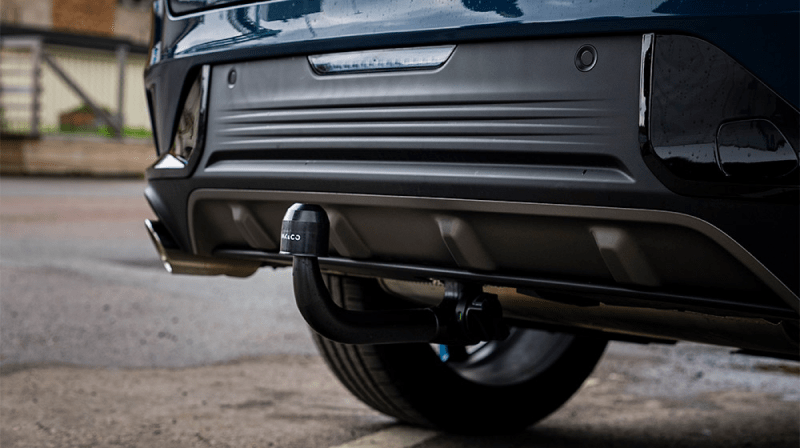 An image of a tow bar mounted on the rear of a Lynk & Co car.